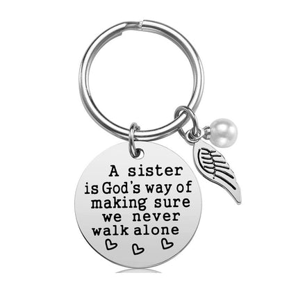 A Sister is God's Way of Making Sure We Never Walk Alone Keychain